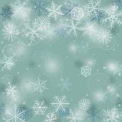 Abstract winter background with various snowflakes.