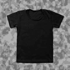 Black blank t-shirt on camouflage background