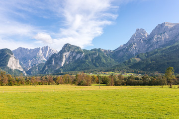 Water gap of the Gesäuse mountain range and view into the Enns valley and the Hochtor massif. The Gesäuse range is part of the Ennstal Alps and a national park in Styria, Austria 