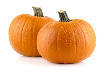 Closeup shot of beaded pumpkins isolated on white
