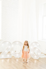 Little girl in christmas decorations