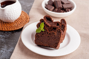 brownie, decorated mint on a plate.