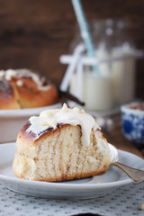 Homemade glazed cinnabon with cinnamon and almonds, american kitchen. .