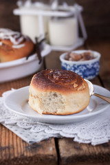 Homemade glazed cinnabons with cinnamon and almonds, american kitchen. .