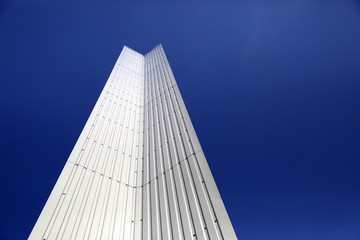 Architectural Detail of steel metal a modern geometry with blue sky background with copy space
