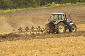 work in the field plowing