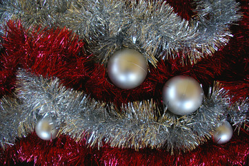 Christmas decoration composition tinsel and baubles texture