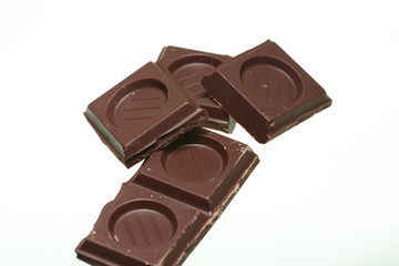 ounce of chocolate isolated on white background