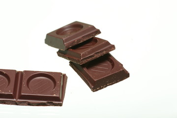 ounce of chocolate isolated on white background