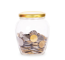 Coins in glass money jar