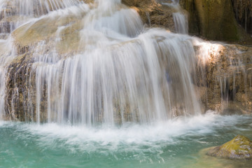 Close up blue stream waterfall © pranodhm