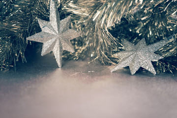 Image of Christmas background with silver star,retro filter inst