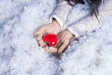 Obraz na płótnie Canvas St. Valentines concept. Hands hold heart