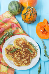pancakes with pumpkin, rosemary and cheese