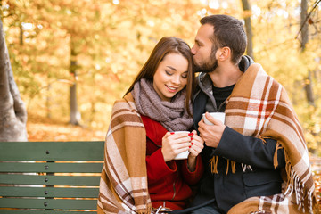 Nice concept for young couple in autumn park