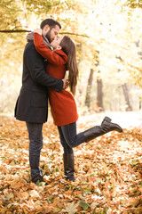 Nice concept for young couple in autumn park