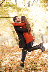 Nice concept for young couple in autumn park