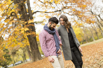 Young couple in the autumn park