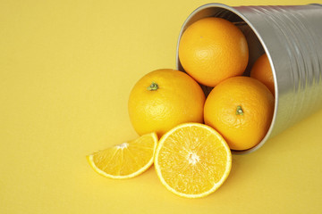 Orange fruits with yellow background