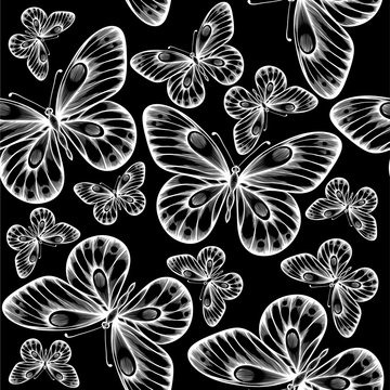 beautiful monochrome black and white seamless background with flying butterflies.