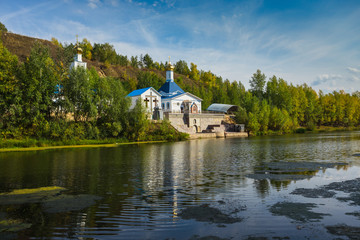 Russian Orthodox Church on the shore of a pond