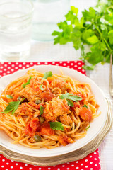 Pasta spaghetti with tuna, capers in tomato sauce