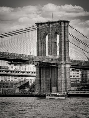 Black and white image of the Brooklyn Bridge in New York