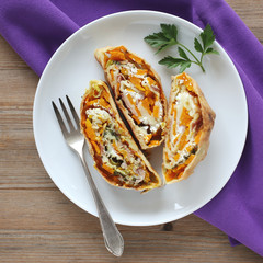 Pumpkin strudel with ham and goat cheese