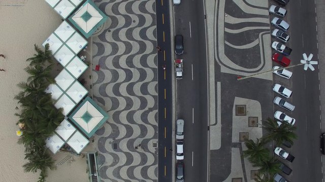 Top View of Copacabana beach with mosaic of sidewalk in Rio de Janeiro. Brazil
