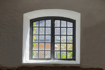 Old beautiful window and white wall