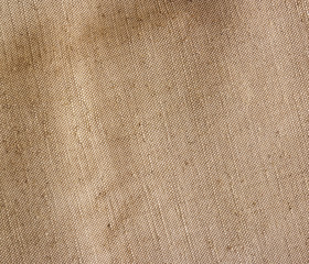 Old canvas, sackcloth. Vintage beige fabric texture, background.