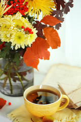 Beautiful autumn bouquet with chrysanthemums flowers, on windowsill