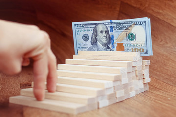 Hand liken business person rise a toy staircase to success, busi