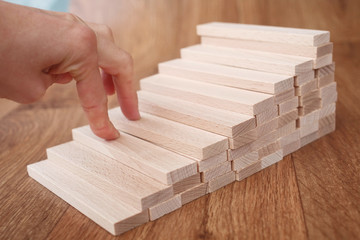 Hand liken business person rise a toy staircase to success, busi