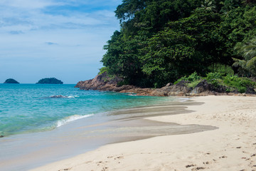 beautiful beach with blue water on the island of ko chang, thailand