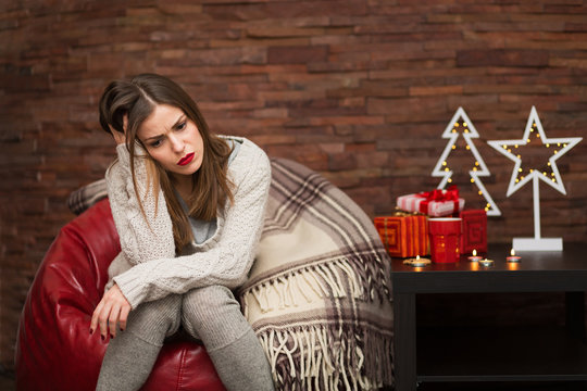 Sad Woman With Gift Boxes