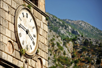 Fototapeta na wymiar Old clock tower in Kotor