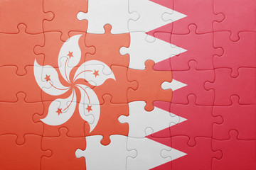 puzzle with the national flag of bahrain and hong kong