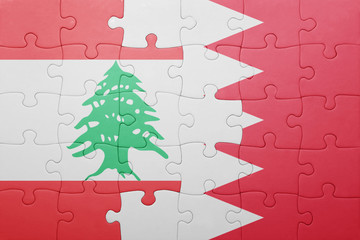 puzzle with the national flag of bahrain and lebanon
