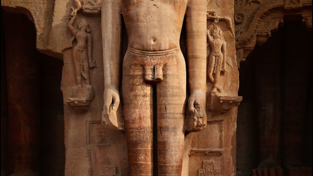 Rockcut statue of Jain thirthankara in rock niche near Gwalior fort. Gwalior, Madhya Pradesh, Indiaatue of Jain thirthankara in rock niches near Gwalior fort. Gwalior, Madhya Pradesh, India