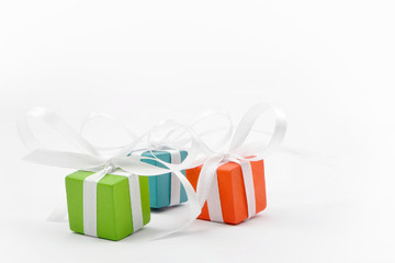 Gifts for Christmas or a birthday - three colourful packages