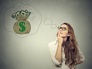 Woman dreaming of financial success - obrazy, fototapety, plakaty