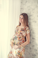 Fototapeta premium Portrait of pregnant woman