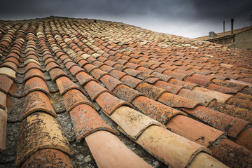 ancient house roof on a cloudy day