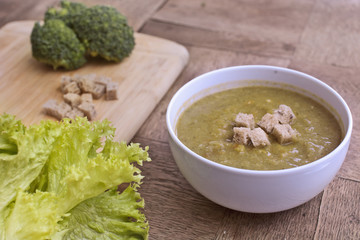 broccoli soup on an old table