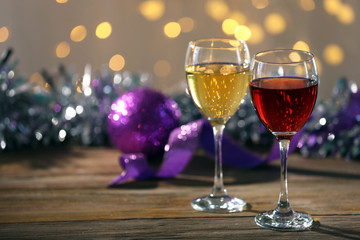 Wine and Christmas decoration on bright background