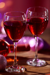 Wine and Christmas decoration on bright background