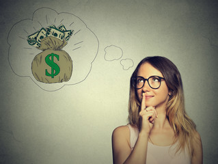 Woman dreaming of financial success