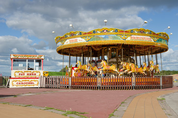 colourful vintage horse carousel at a Fairground
