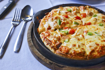 Italian Pizza on Dinner Table.